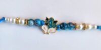 Blue Ganesha Rakhi 2 with White BG 1